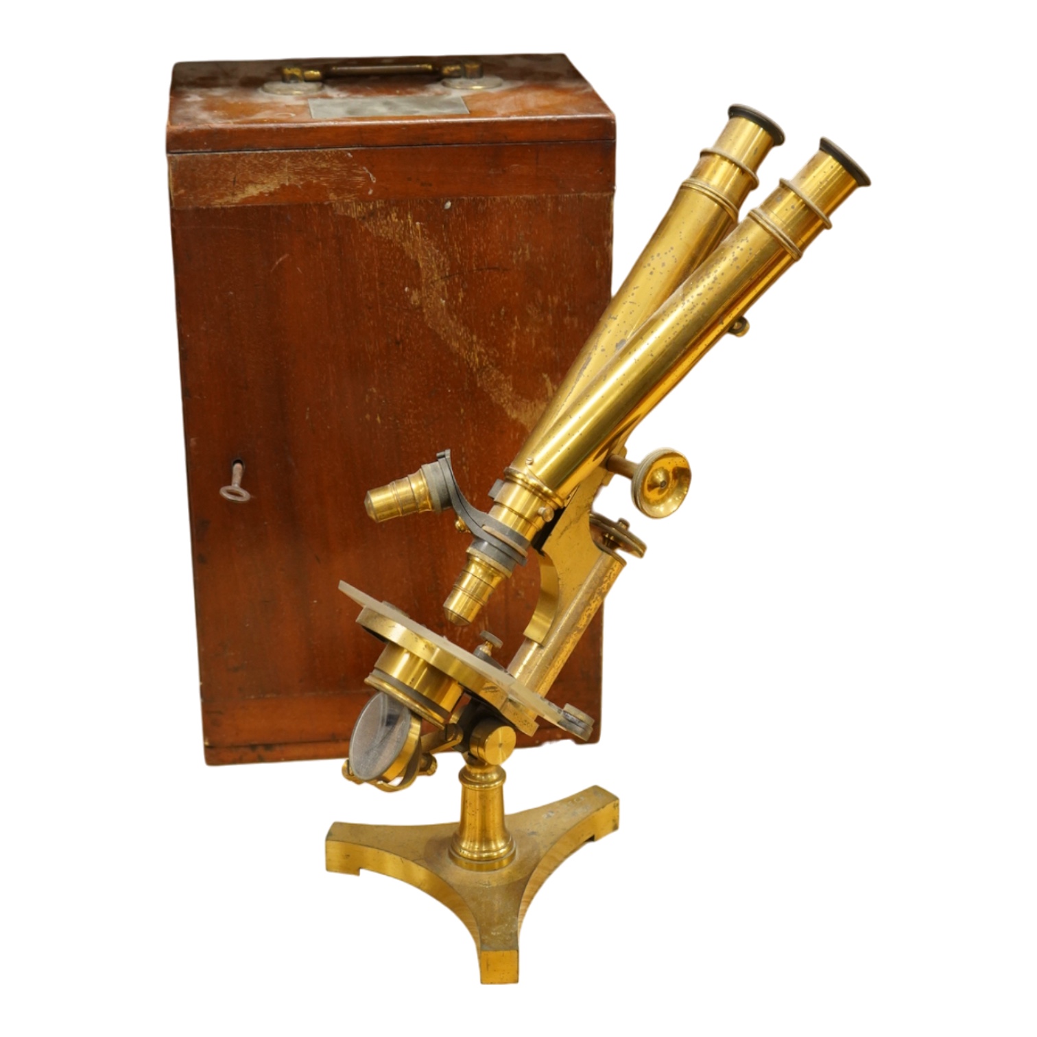 A late 19th century brass compound binocular microscope, by R. & J. Beck, London, number 13654, mahogany cased, together with accessories, including a pair of eye pieces and three objectives. Instrument height 39cm
